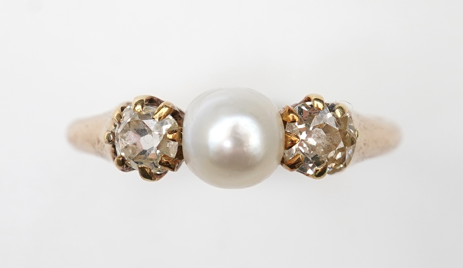 A late Victorian pearl and diamond ring, circa 1900